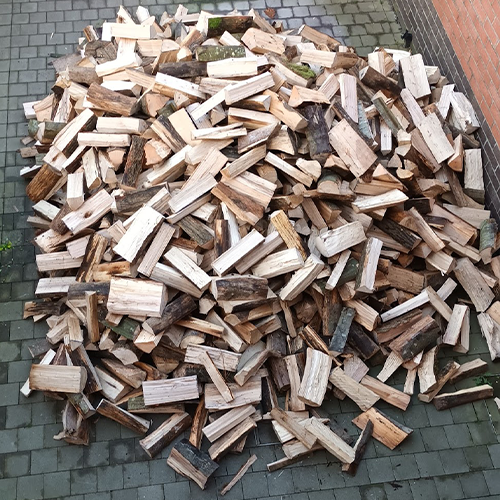 Une livraison de bois de chauffage dur en 30cm en vrac dans le Nord par Chthibois de Hondeghem