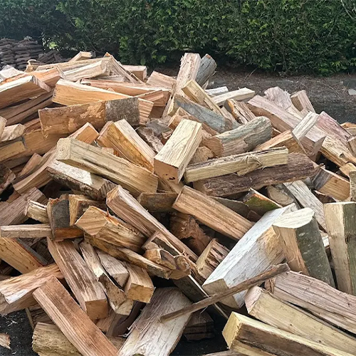 Une livraison de bois de chauffage dur en 50cm déposé en vrac dans le Nord par Chthibois de Hondeghem